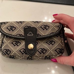 Dooney & Bourke snap cosmetic wristlet